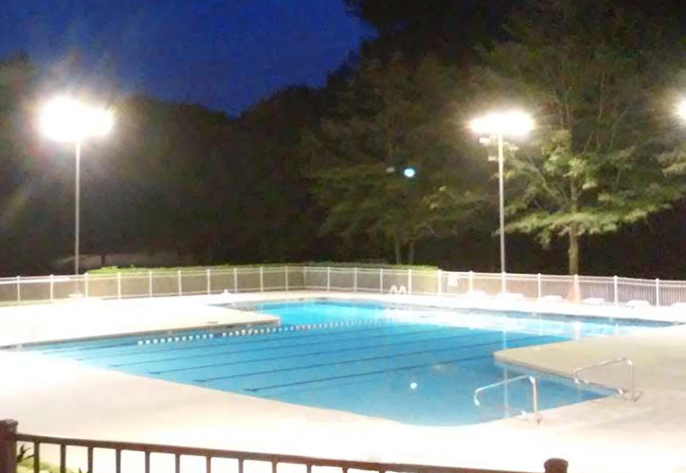 What should be considered when choose LED fixtures in swimming pool lighting?